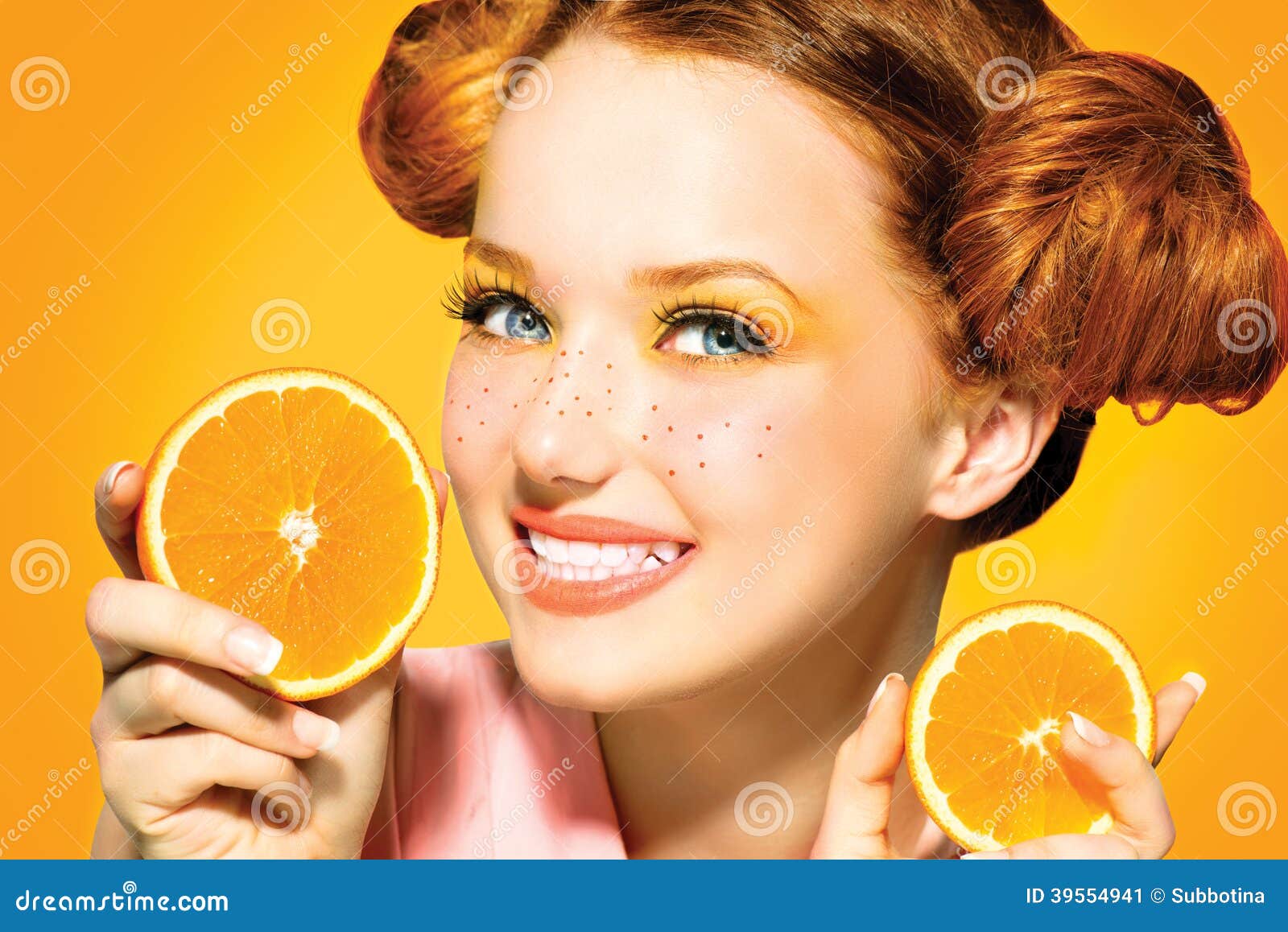 beauty joyful teen girl with juicy oranges