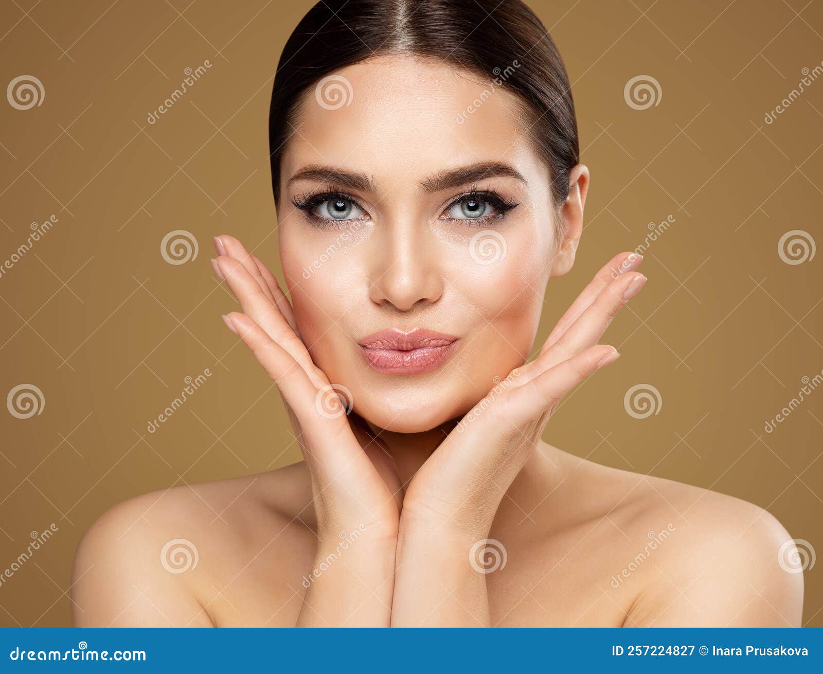 beauty model showing cheekbones and full lips. beautiful woman face skin care. women dermal filler and permanent make up