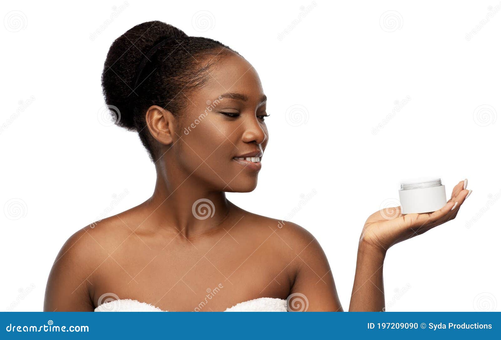 smiling african american woman with moisturizer