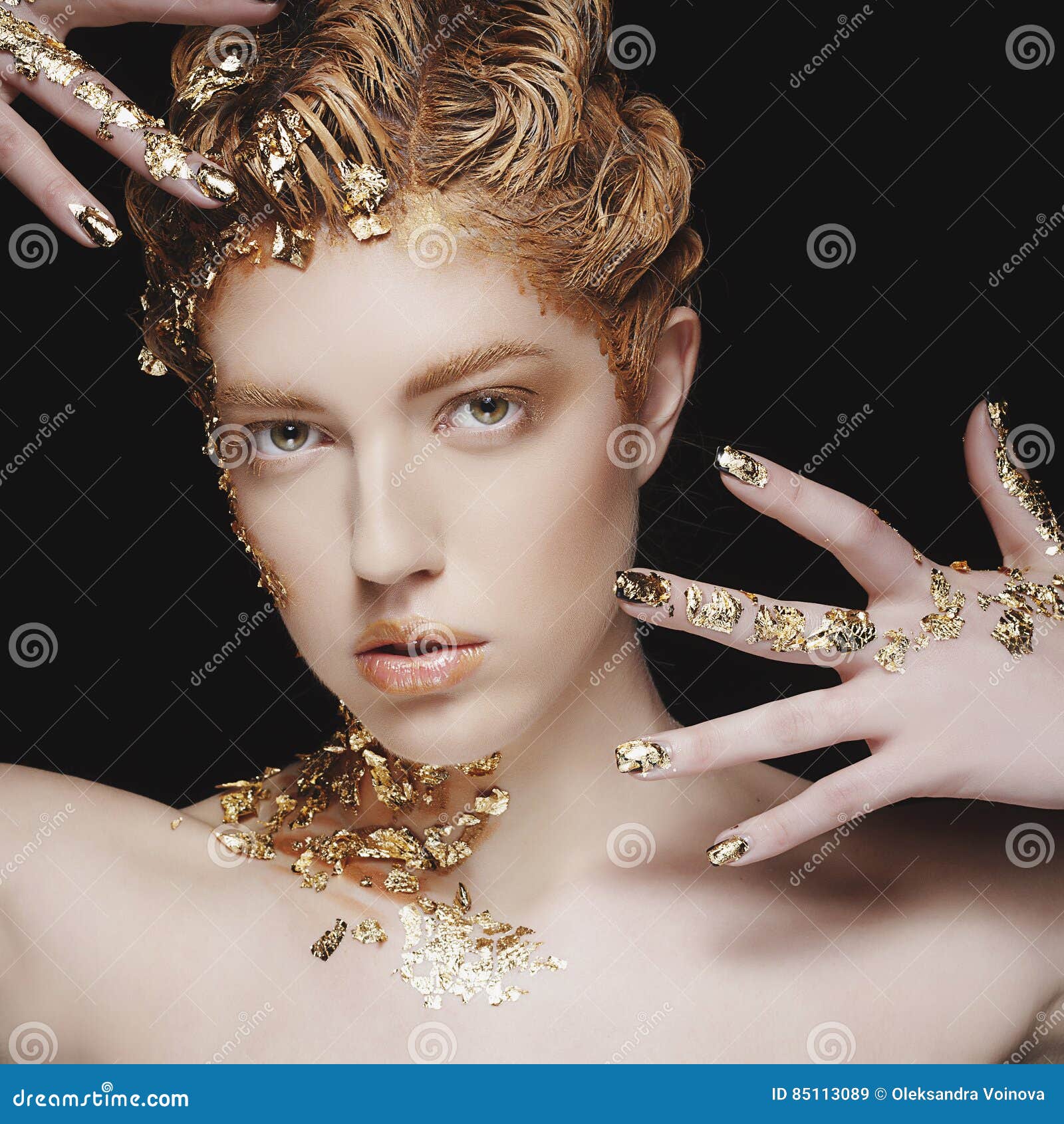 Beauty Portrait. Beautiful Fashion Model with Gold Foil on Stock Image ...