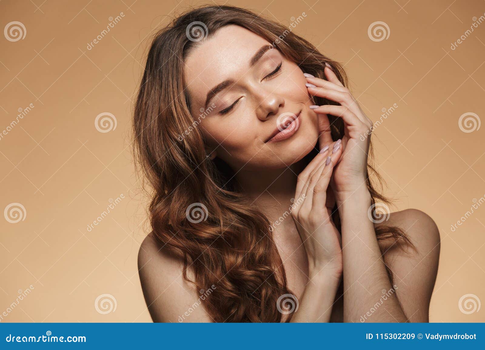 Portrait of a smiling young woman washing dishes Stock Photo by vadymvdrobot