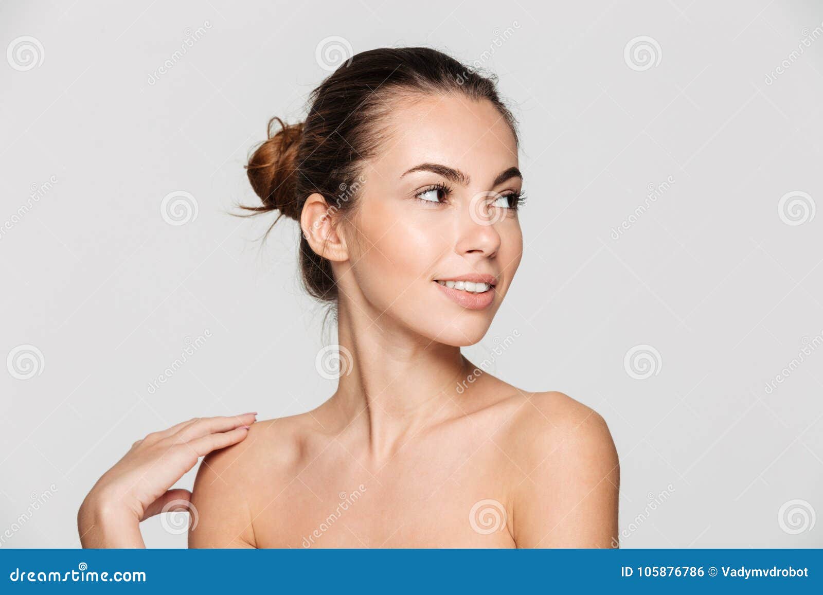Beauty portrait of a young attractive half naked woman 