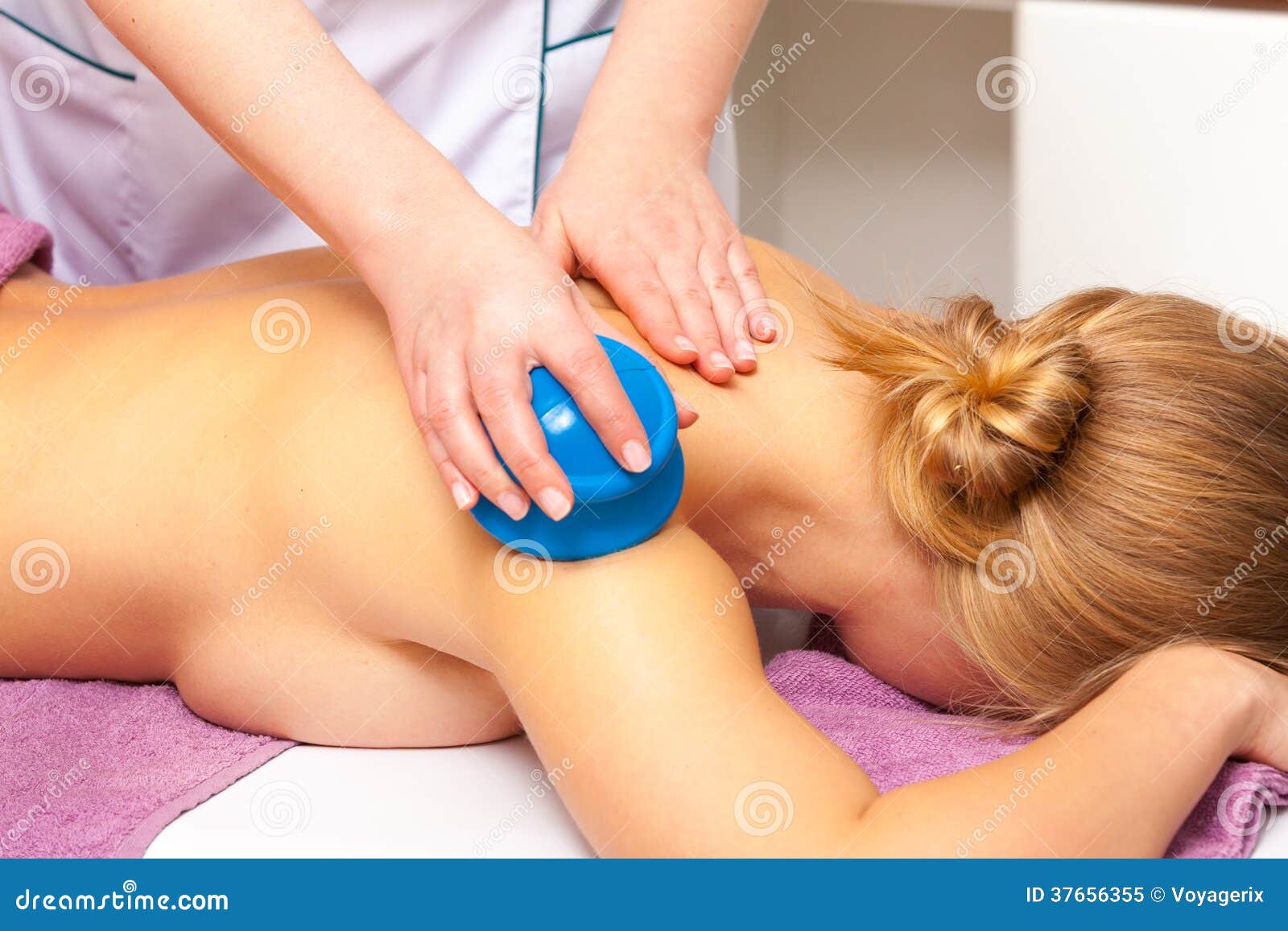 beauty salon. woman getting spa cupping glass vacuum massage