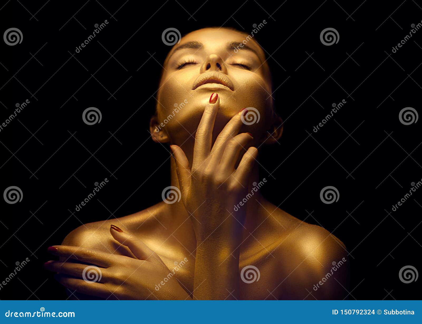 beauty sexy woman with golden skin. fashion art portrait closeup. model girl with shiny golden professional makeup