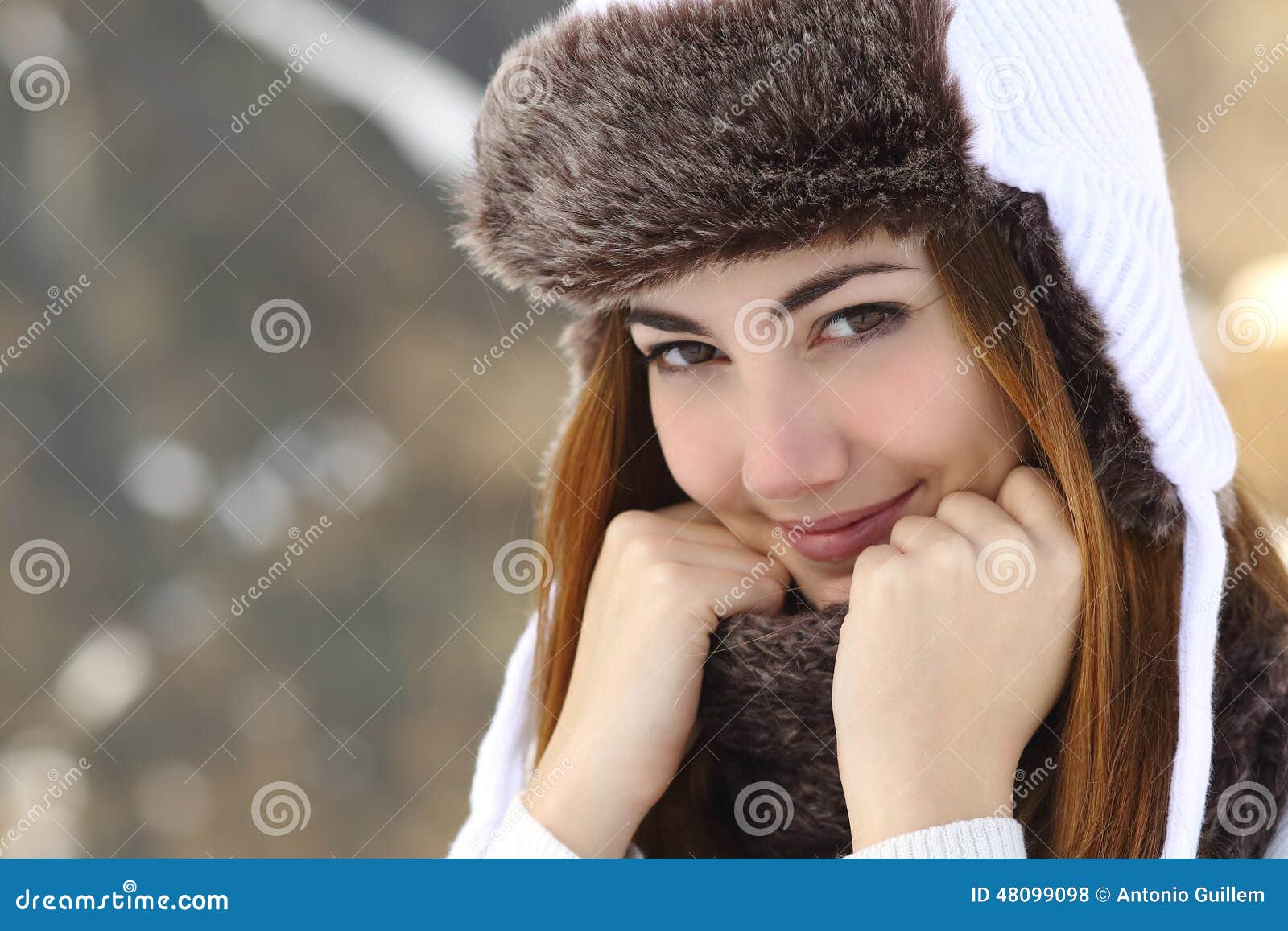 beauty woman face portrait warmly clothed in winter