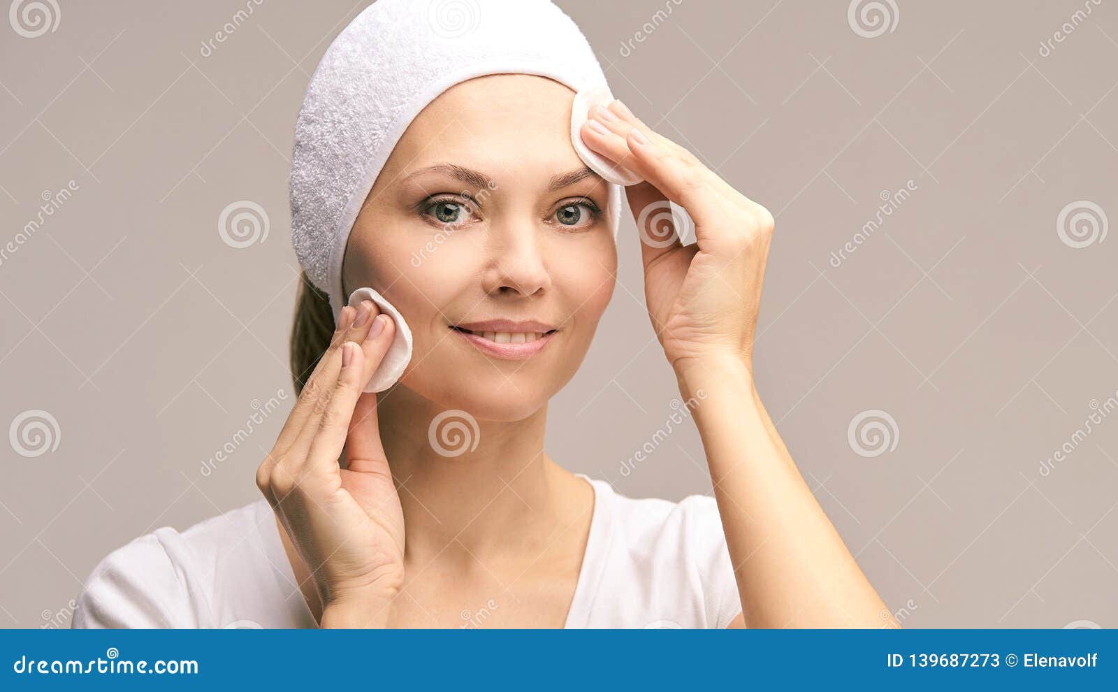 beauty woman natural make up. remove mascara. cotton pad