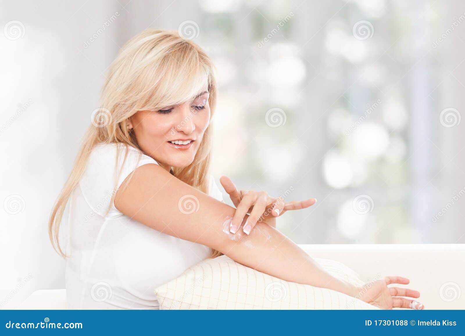 beauty woman using moisturising cream