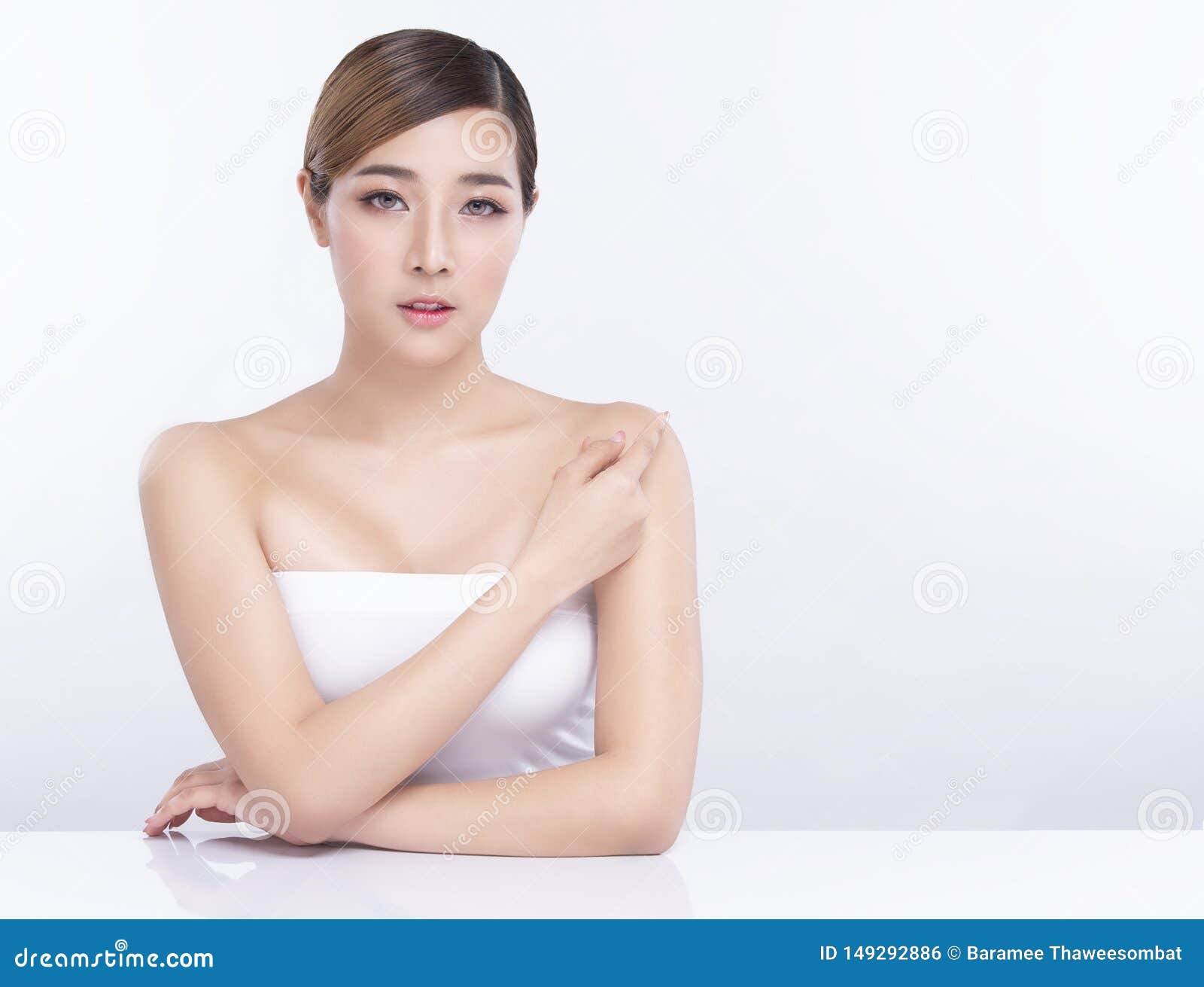 beauty young asian woman with perfect facial skin. gestures for advertisement treatment spa and cosmetology
