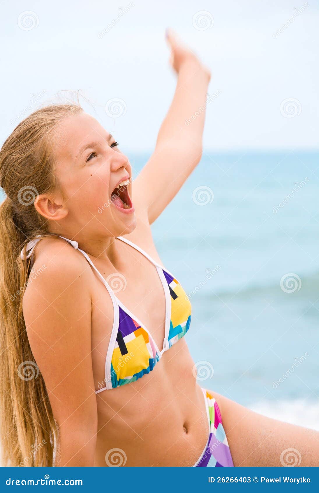 Young Girl On The Beach