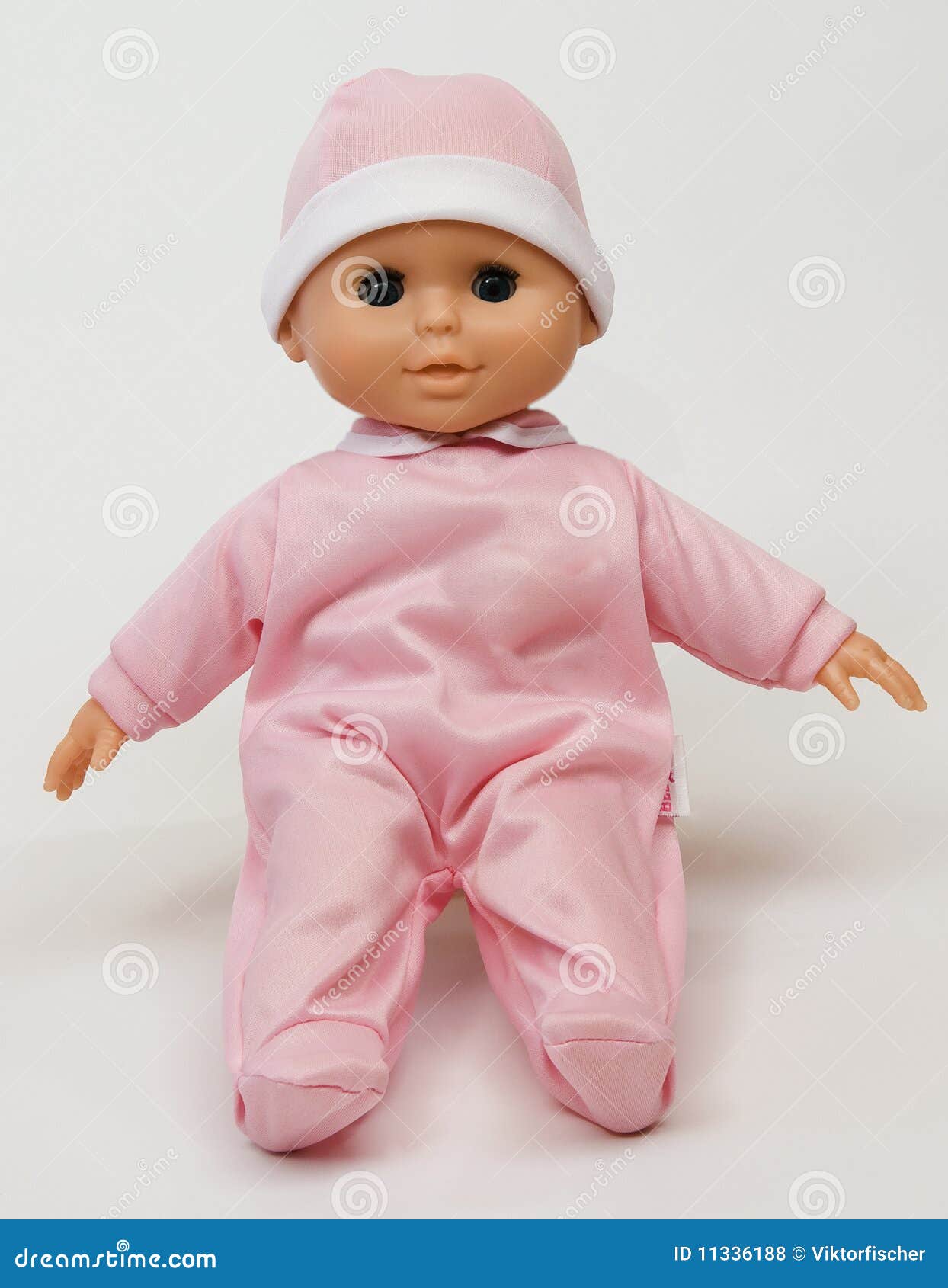 Bebê - boneca. Bebê bonito - boneca vestida na cor-de-rosa