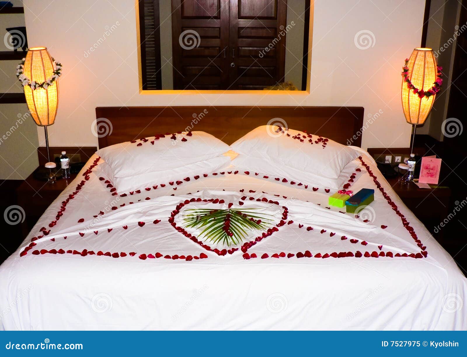 Bed with flowers stock image. Image of petals, green, lamp 7527975