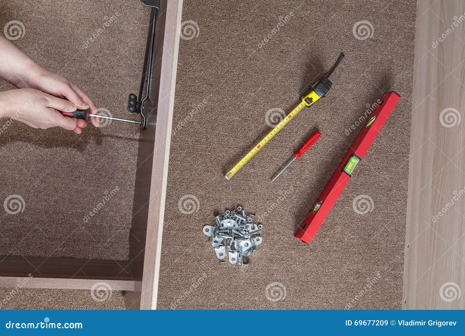 Bed Frame Assembling, Hands Carpenter Screwed Using Screwd Stock Image