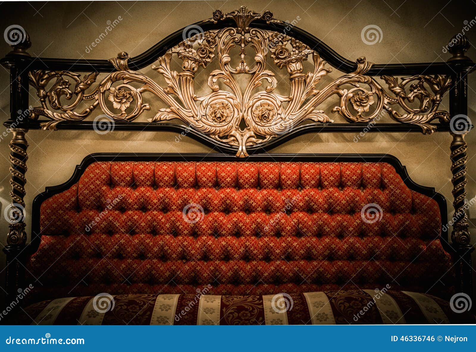 Bed with golden ornament stock photo. Image of decor 46336746