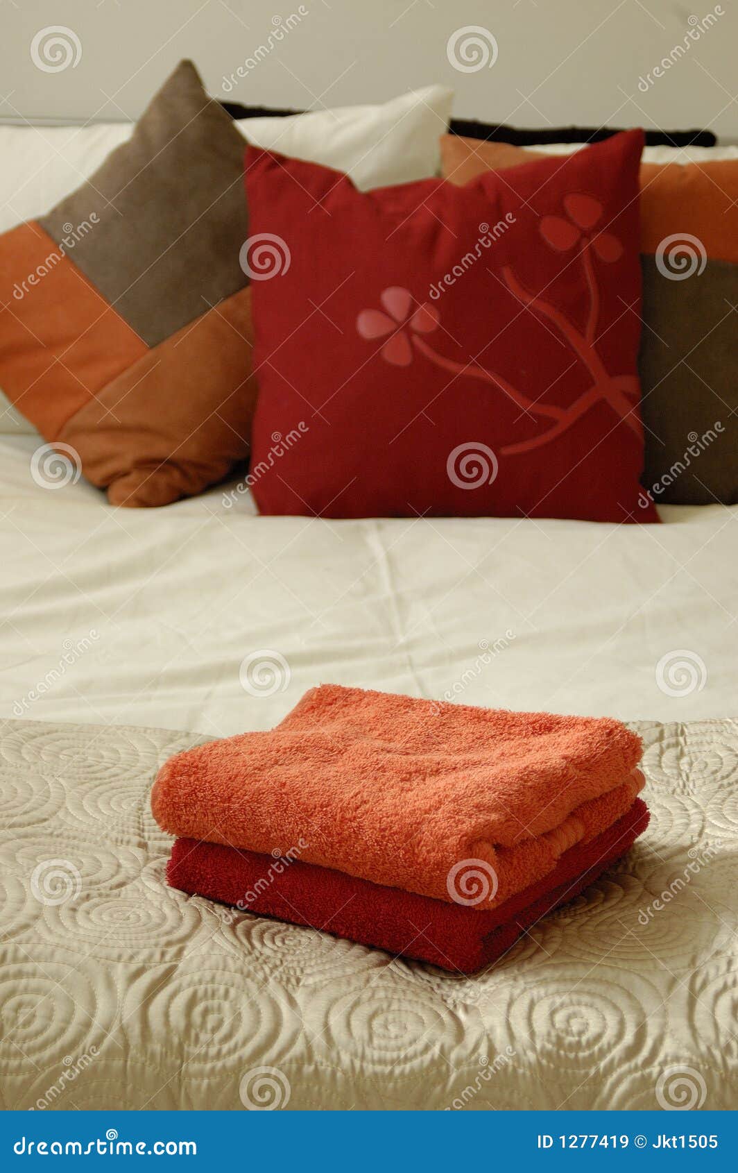 Bed, pillows and towels stock image. Image of towel, snug 1277419