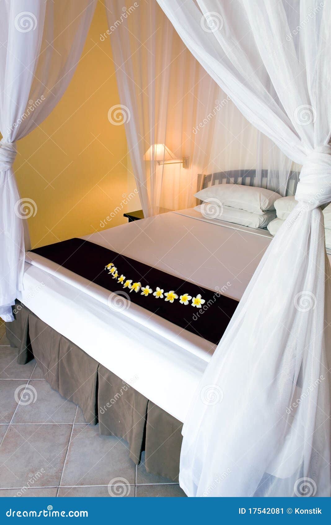 Bed under bed curtains stock image. Image of hotel, apartment 17542081