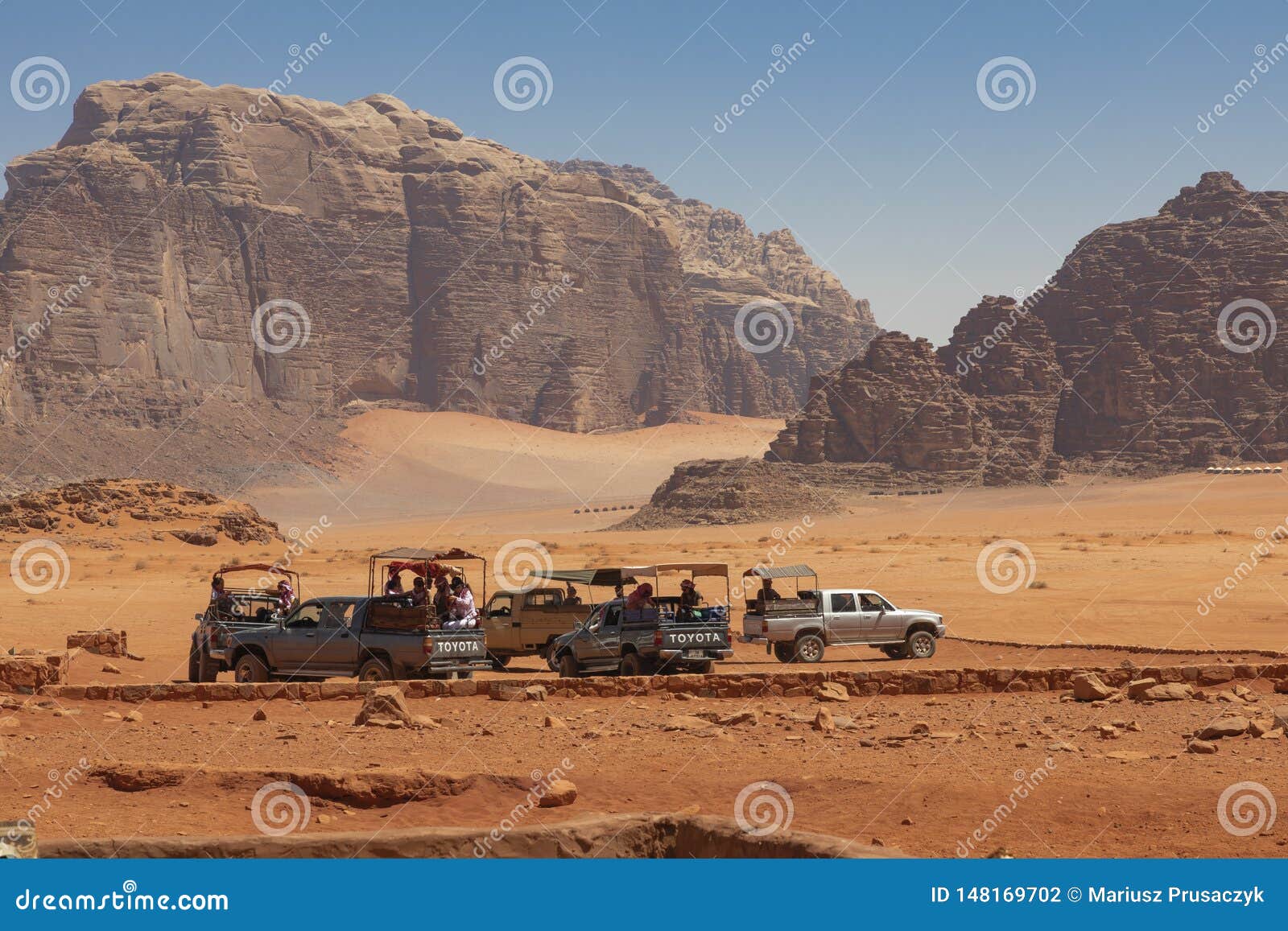 Bedouin`s Car Jeeps And Tourists Wadi Rum Desert In Jordan Middle