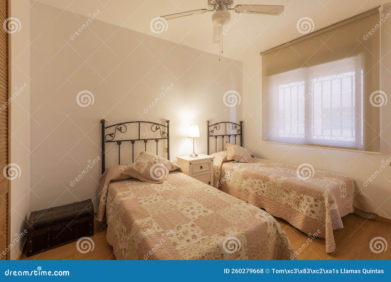 Bedroom with Double Beds with Bedspreads and Twin Headboards Stock