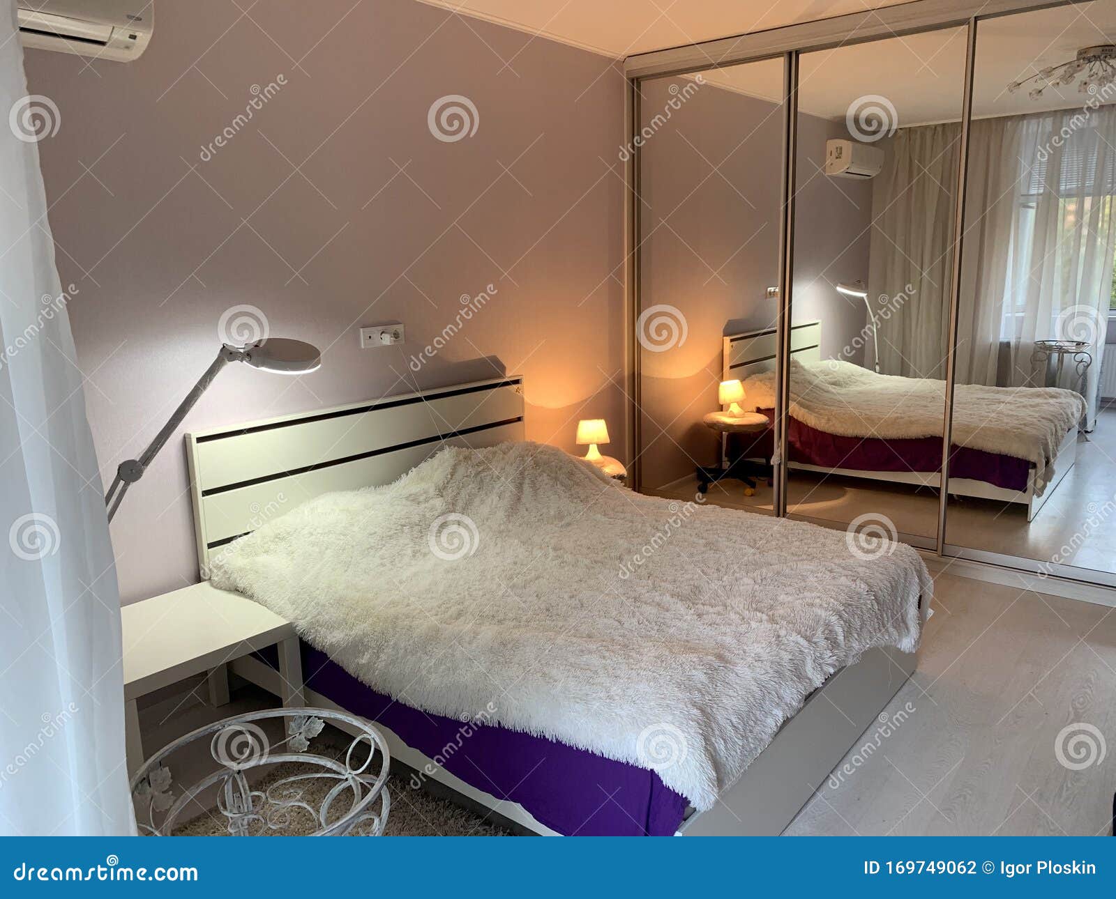 Bedroom with Mirrored Wardrobe Stock Photo Image of furniture