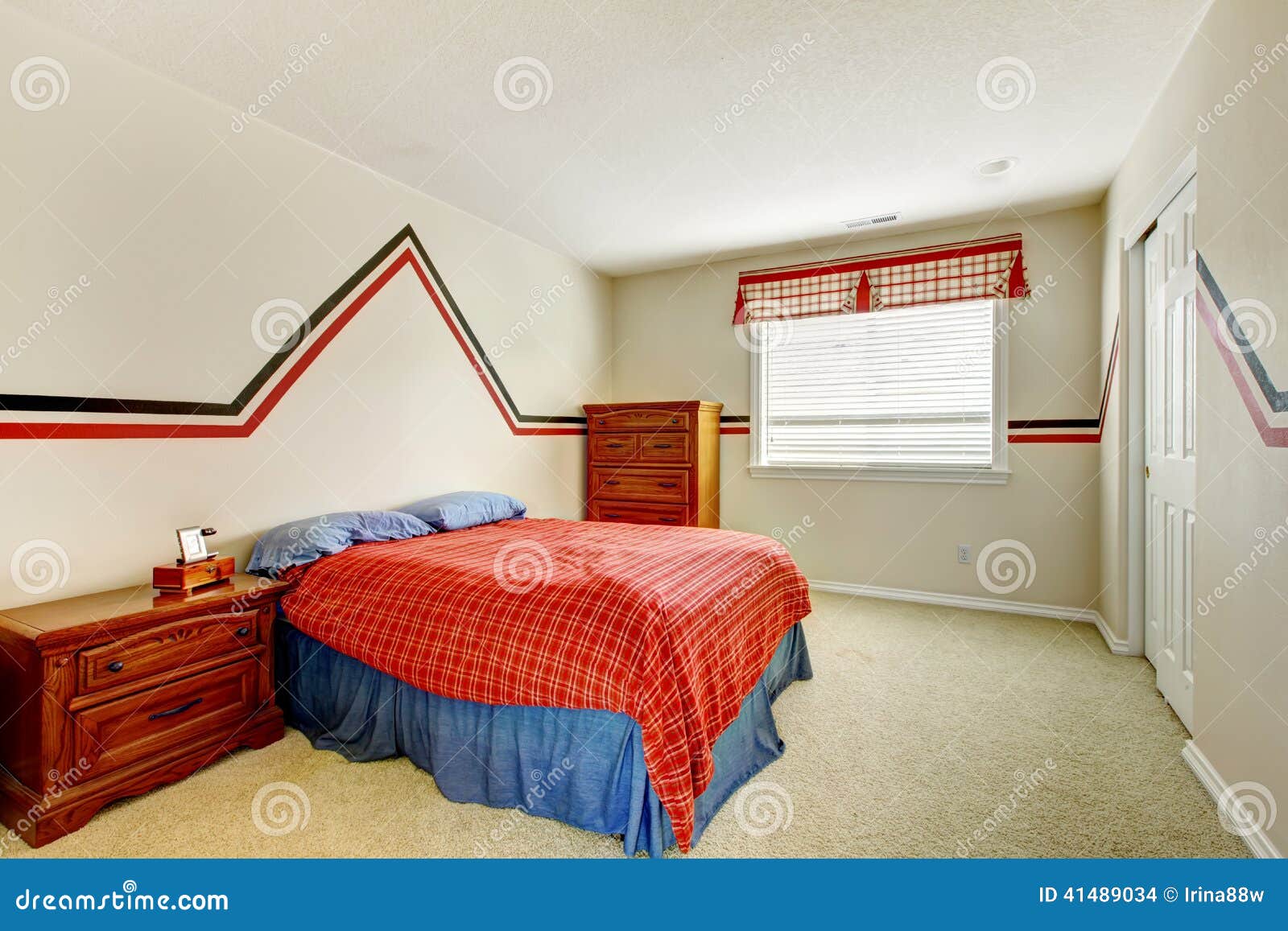 Bedroom With Painted Wall And Bright Colors Bed Stock Photo