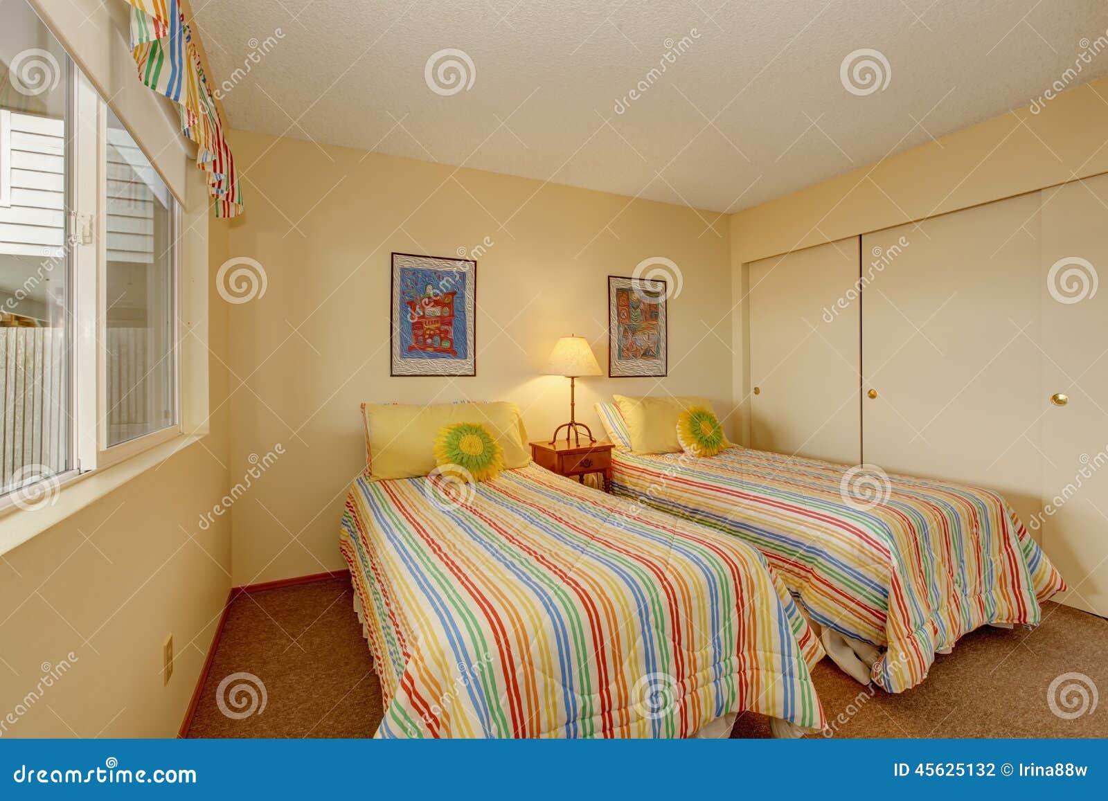 Bedroom with Two Single Beds in Cheerful Bedding Stock Photo - Image of ...