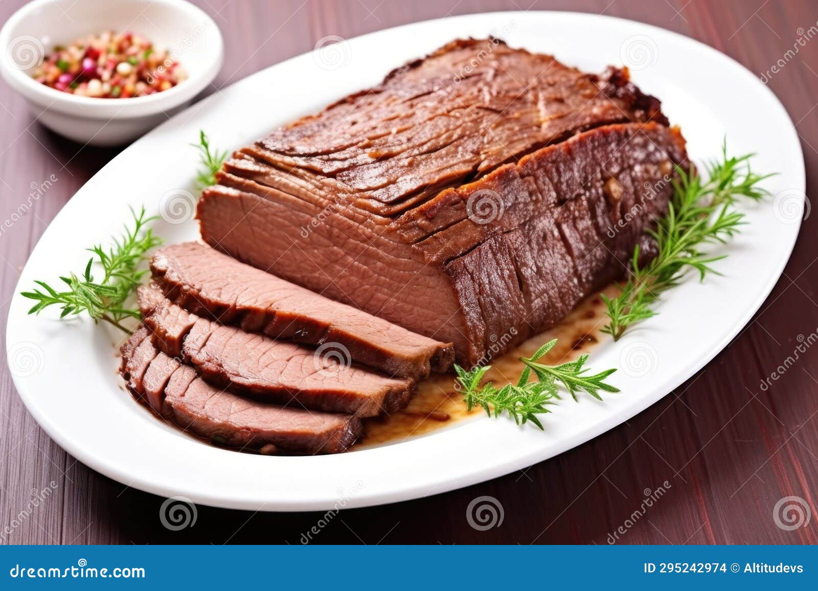 Beef Brisket with a Light Glaze, on a White Ceramic Plate Stock Photo