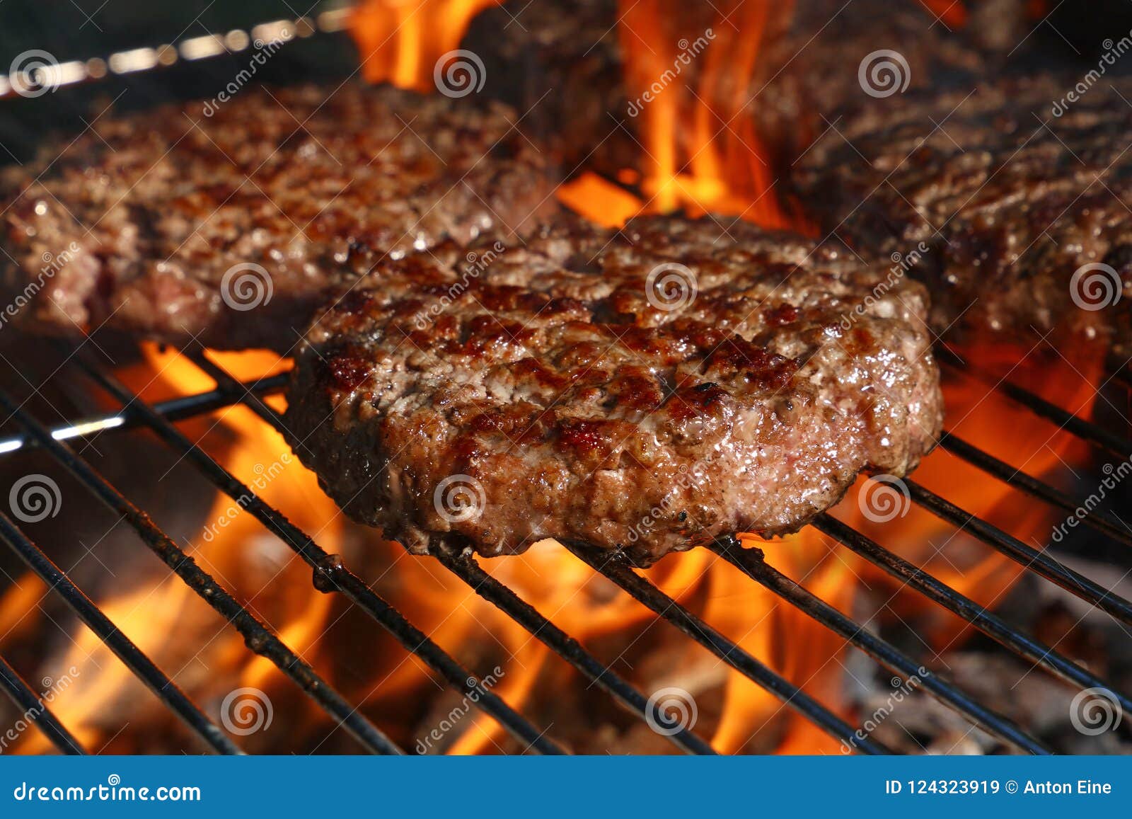 Beef Burger for Hamburger on Barbecue Flame Grill Stock Image