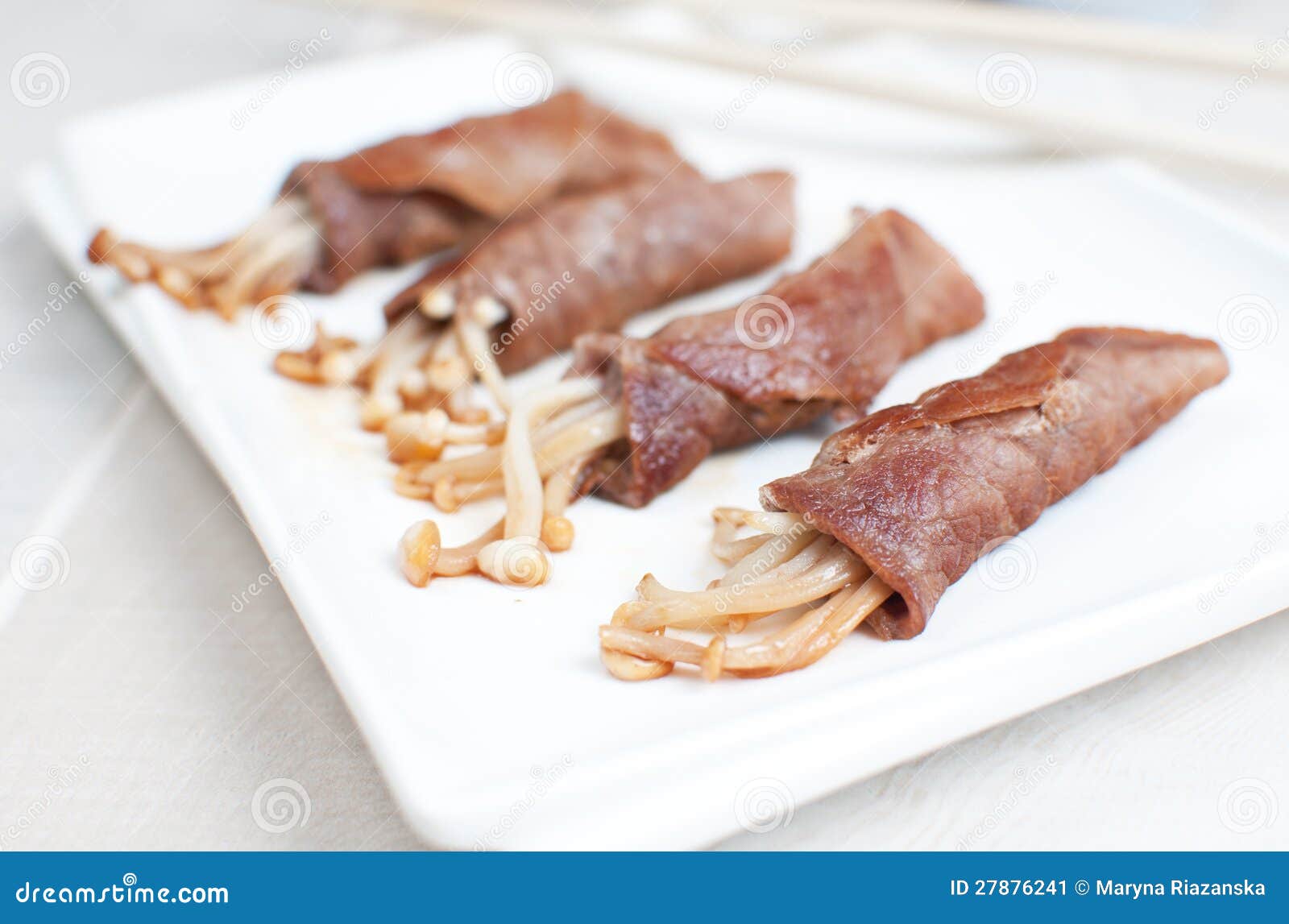 Beef with enoki mushrooms stock image. Image of served 27876241