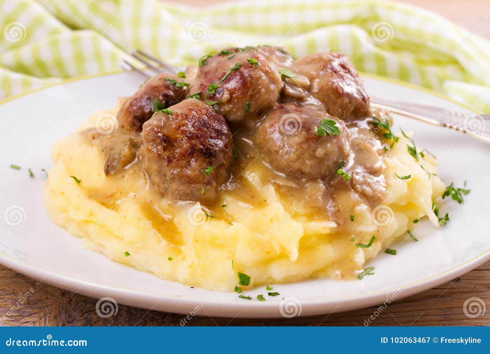 Beef Meatballs with Mushroom Gravy on Mashed Potato. Stock Image