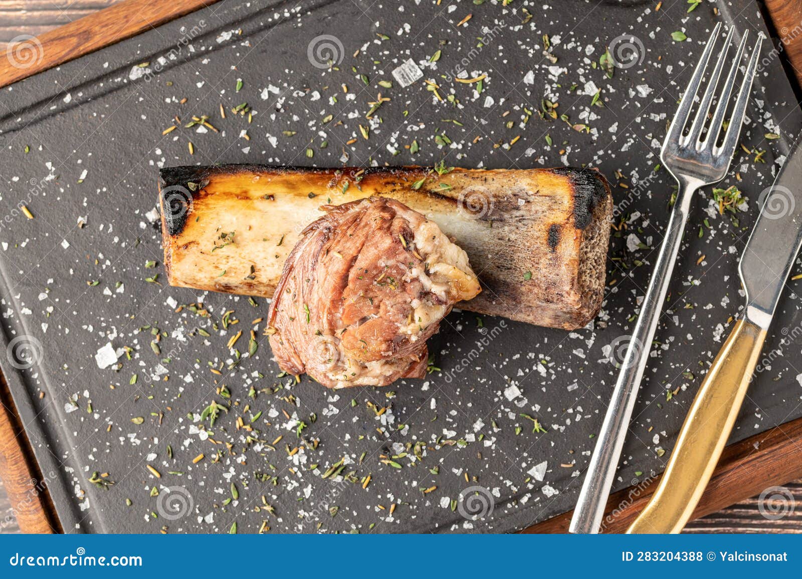 Beef Rib Asado on Stone Cutting Board at Steakhouse Stock Photo Image