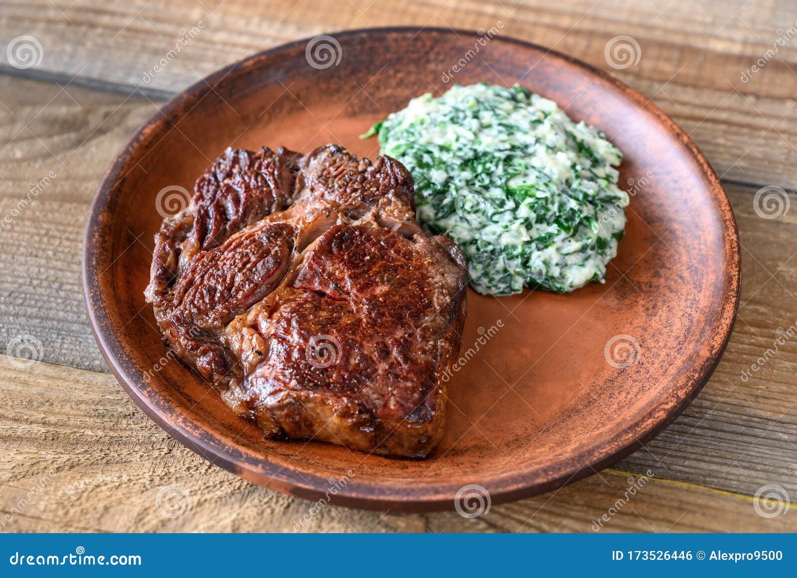 Beef Steak with Creamy Spinach Stock Photo - Image of porterhouse