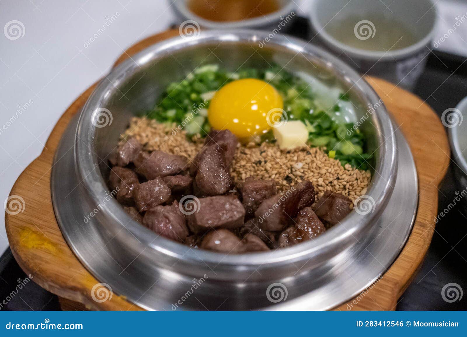 Beef Steak Rice in a Steamed Pot with Egg. Stock Photo - Image of asian