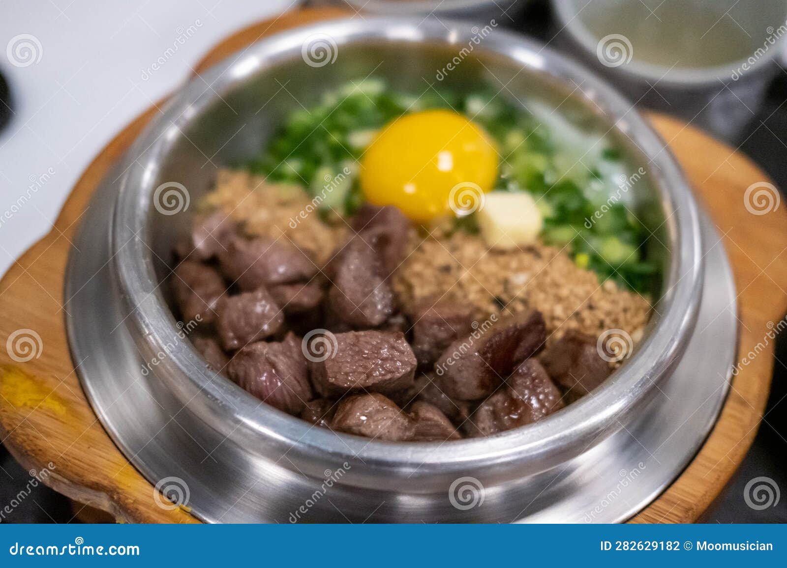 Beef Steak Rice in a Steamed Pot with Egg. Stock Photo - Image of pork