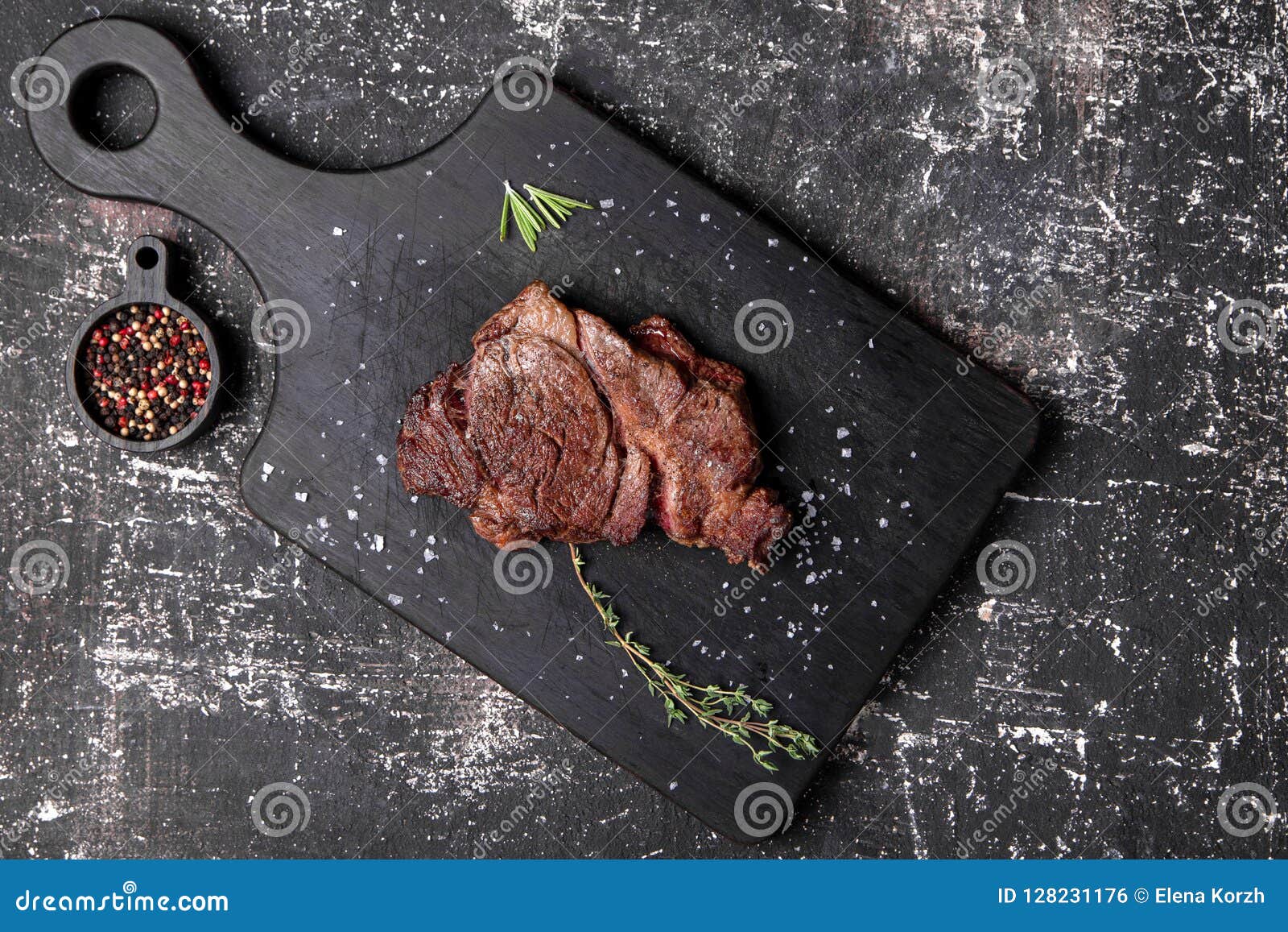 Beef Steak with Thyme and Rosemary Stock Photo Image of board