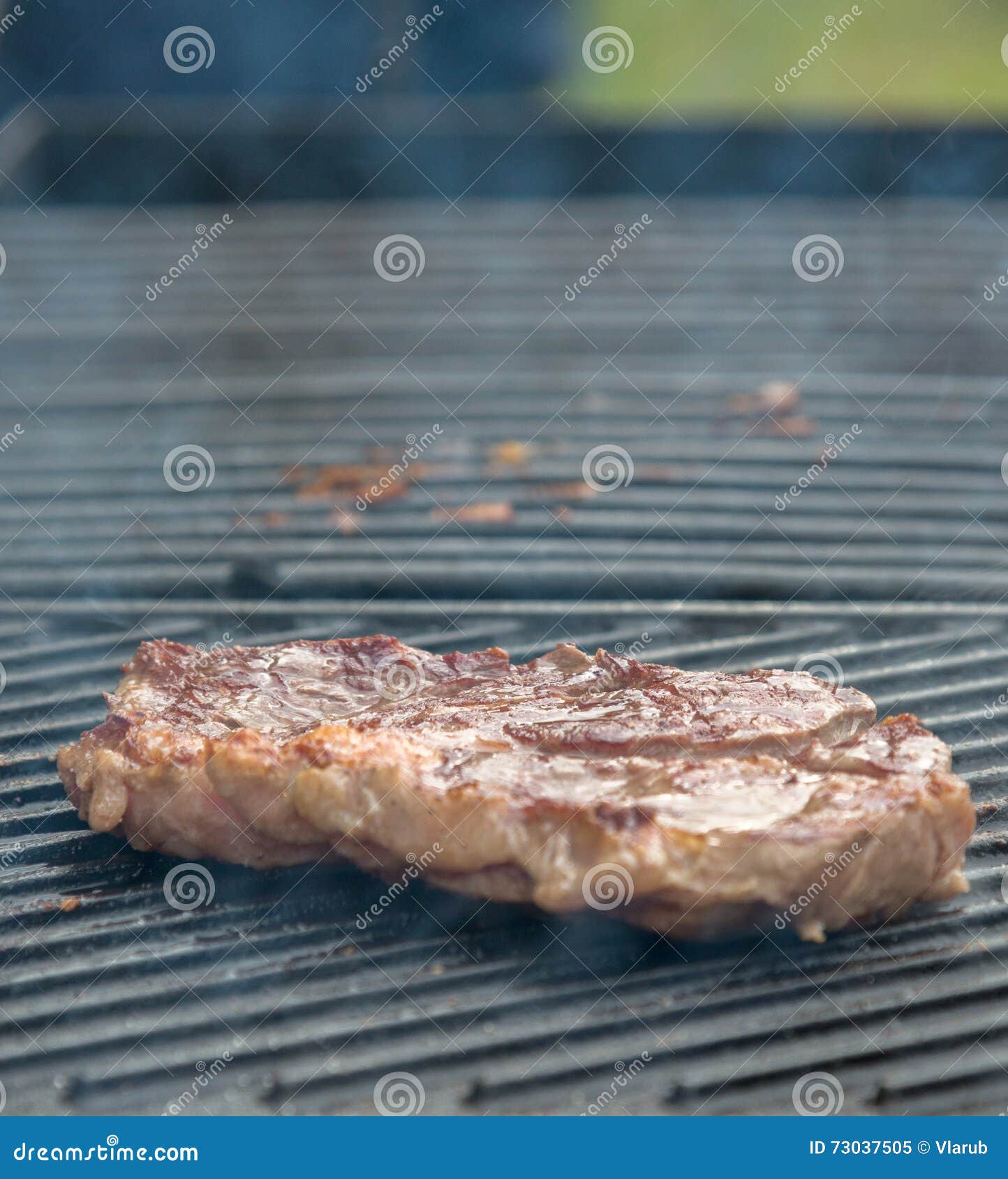 Beef steaks on the grill stock image. Image of grilled 73037505