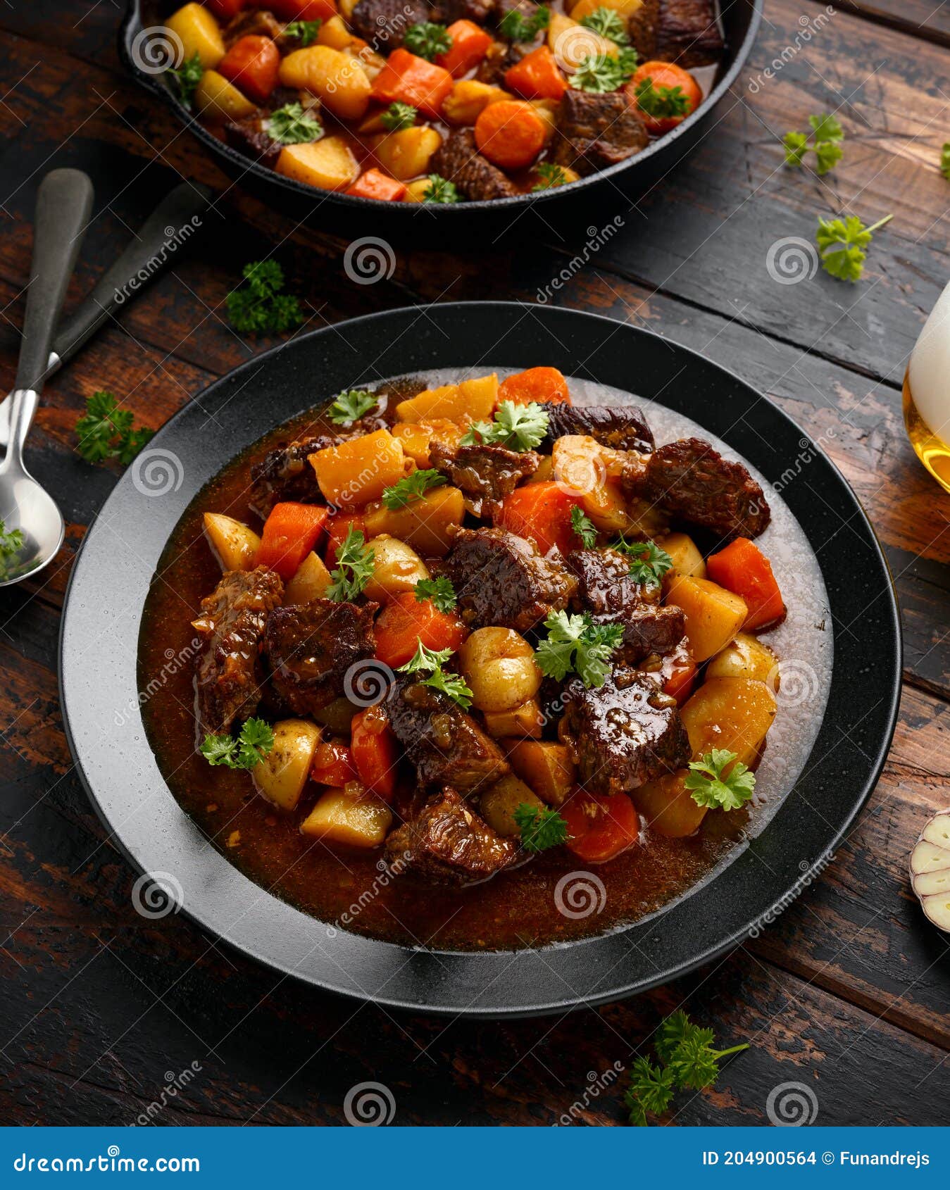 Beef Stew with Carrot and Baby Potato in Iron Cast Pan Stock Photo