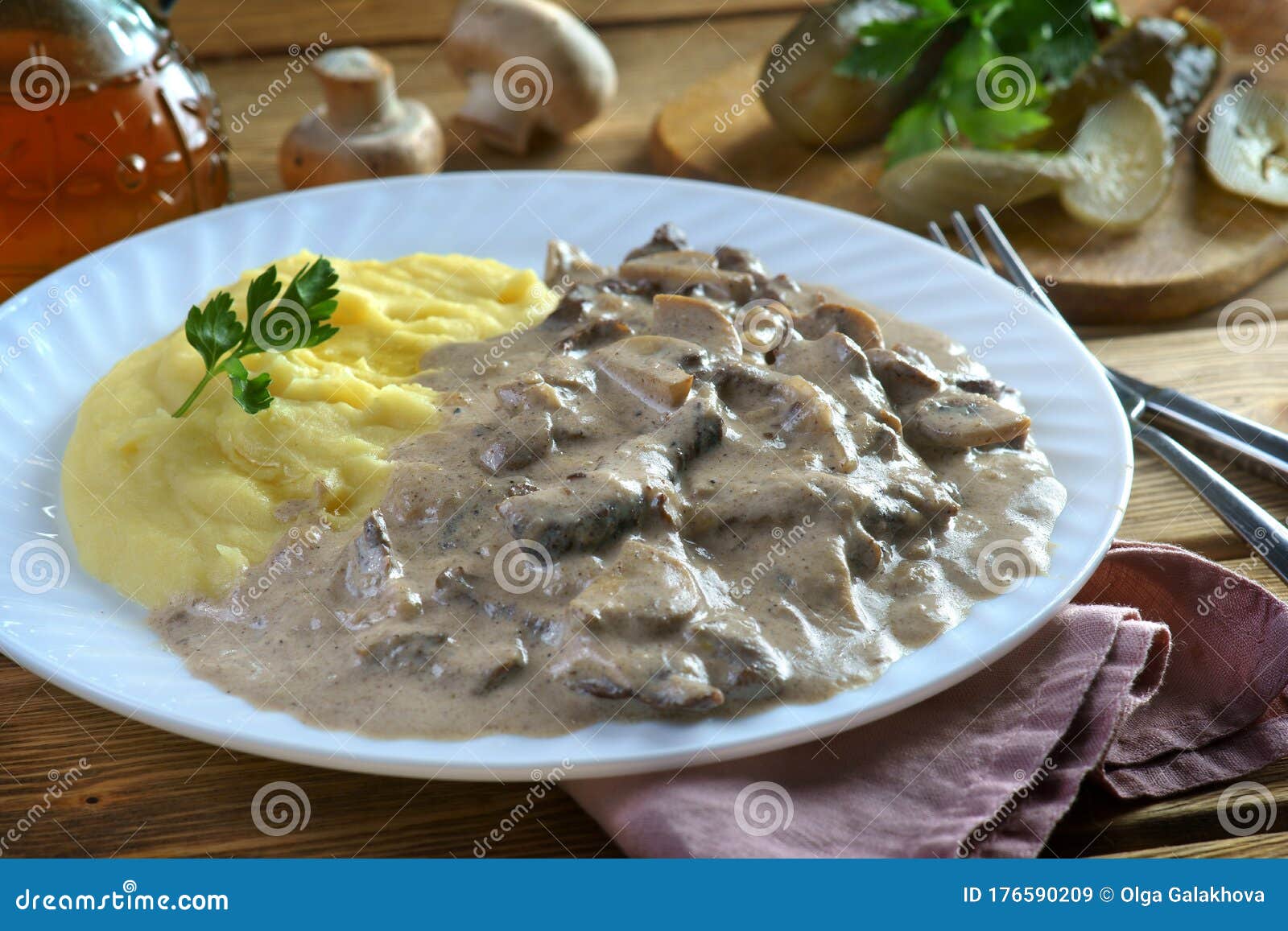 Beef Stroganoff with Mashed Potatoes on a Wooden Background Stock Image