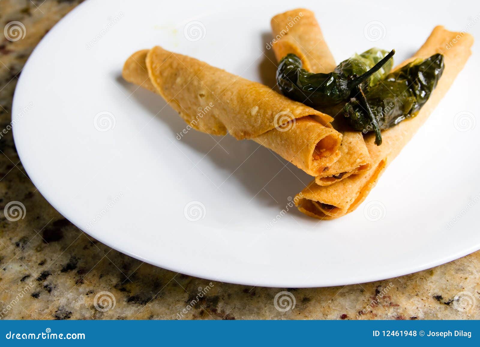 Beef taquitos chili on top stock photo. Image of spice 12461948