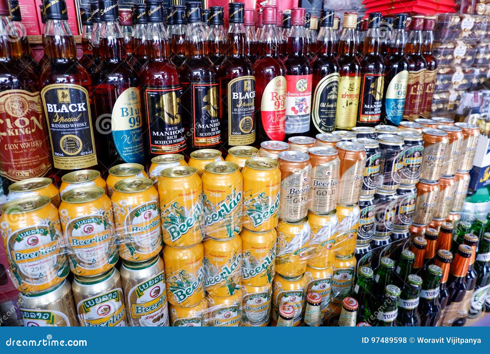 Beer and alcohol in market editorial stock photo. Image of placements