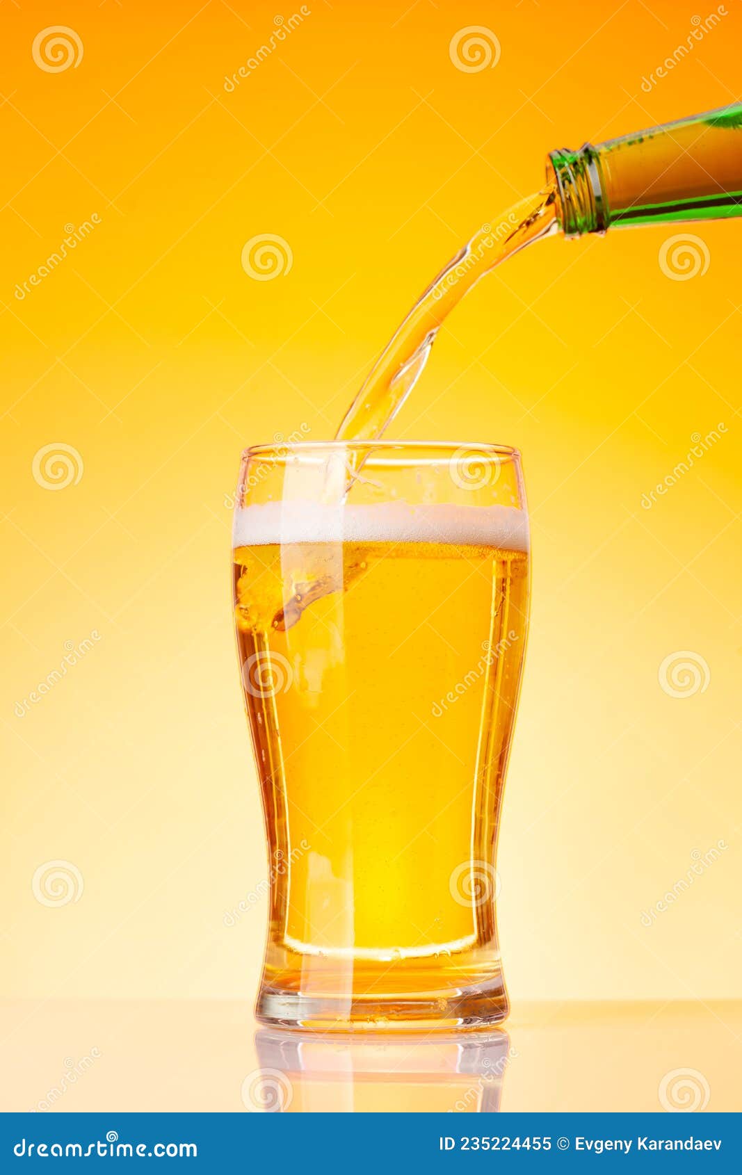 Beer bottle and glass stock image. Image of liquid, advert 235224455