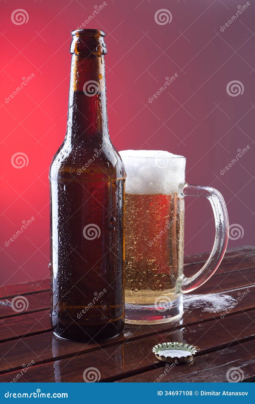 Beer bottle and a glass stock photo. Image of celebration 34697108
