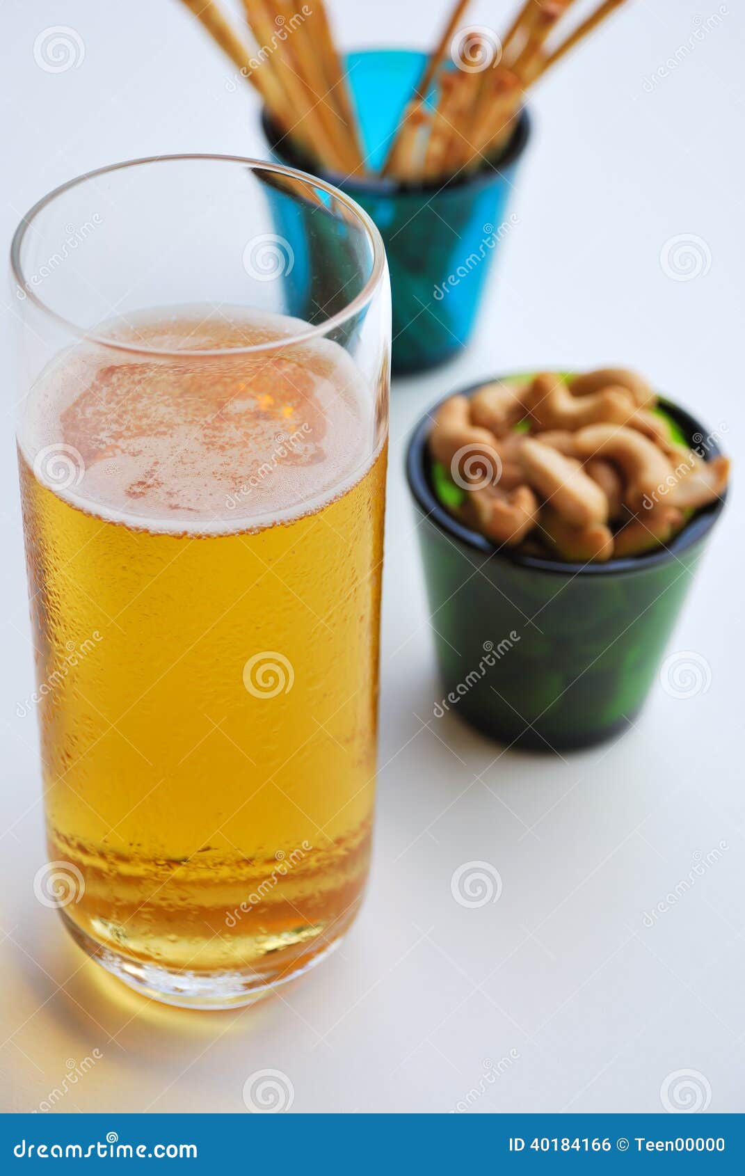 Beer And Cashew Nuts RoyaltyFree Stock Photography