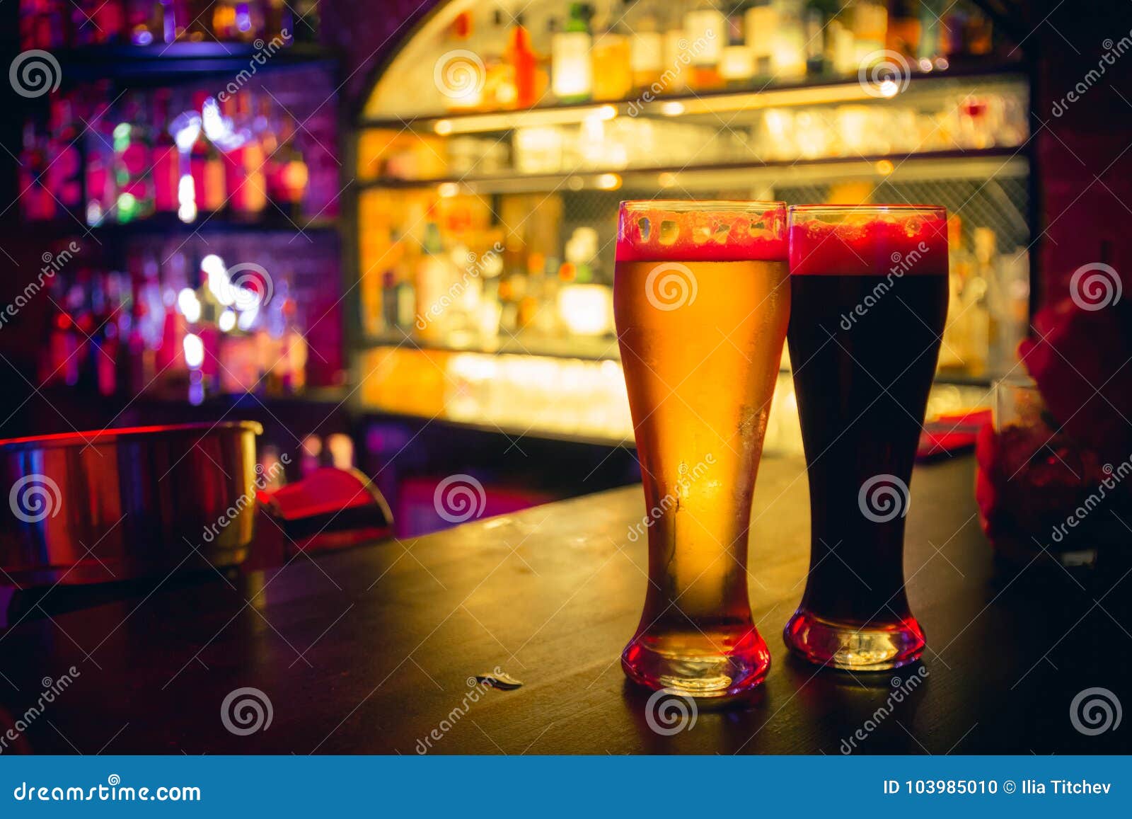 2 Beer Glasses at the Bar Counter Stock Photo Image of indoors, neon
