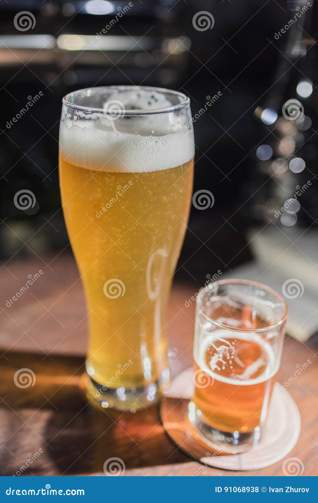 Boot Shaped Beer Glasses Filled with Frothy Lager Stock Image - Image of  advertising, garden: 75516965