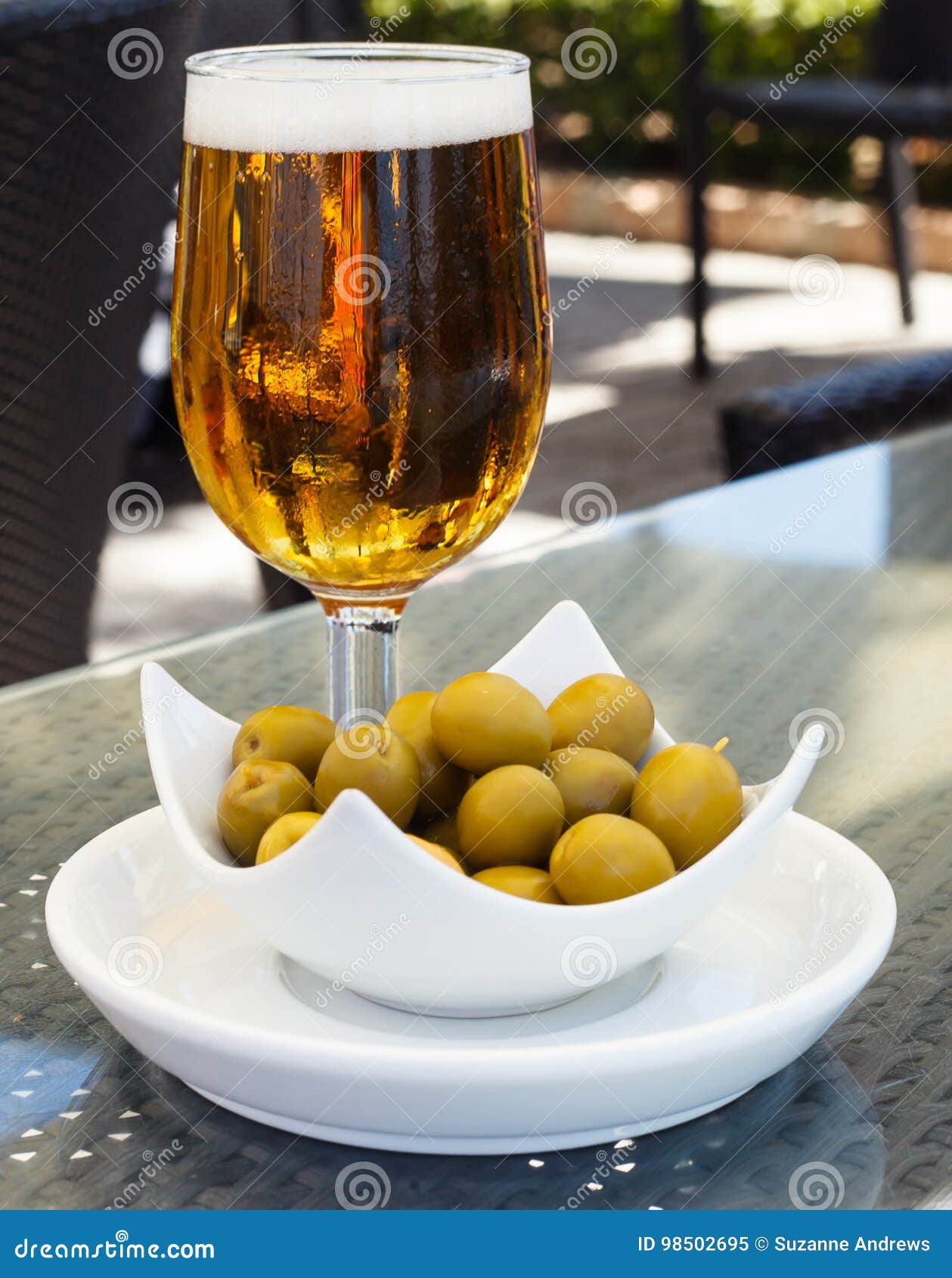 Beer and olives stock image. Image of marinated, glass 98502695