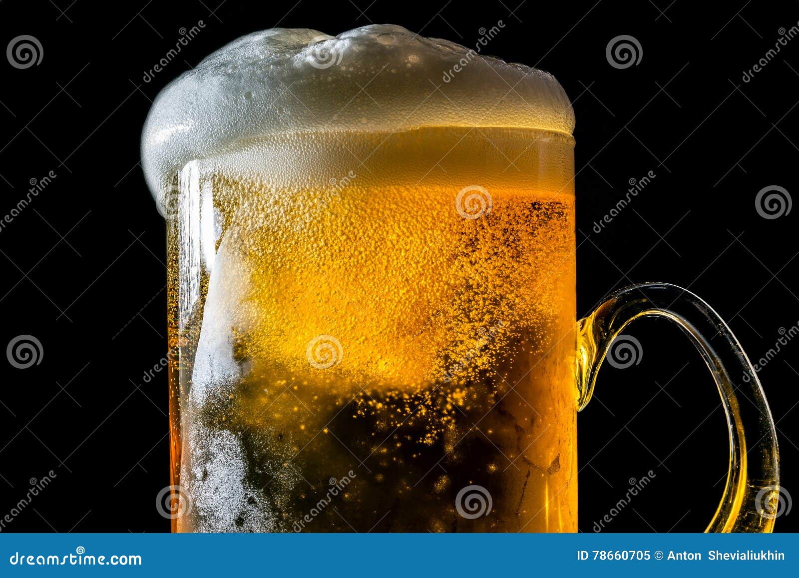 Beer Overflowing Large Glass With Foam And Bubbles Isolated Stock Image