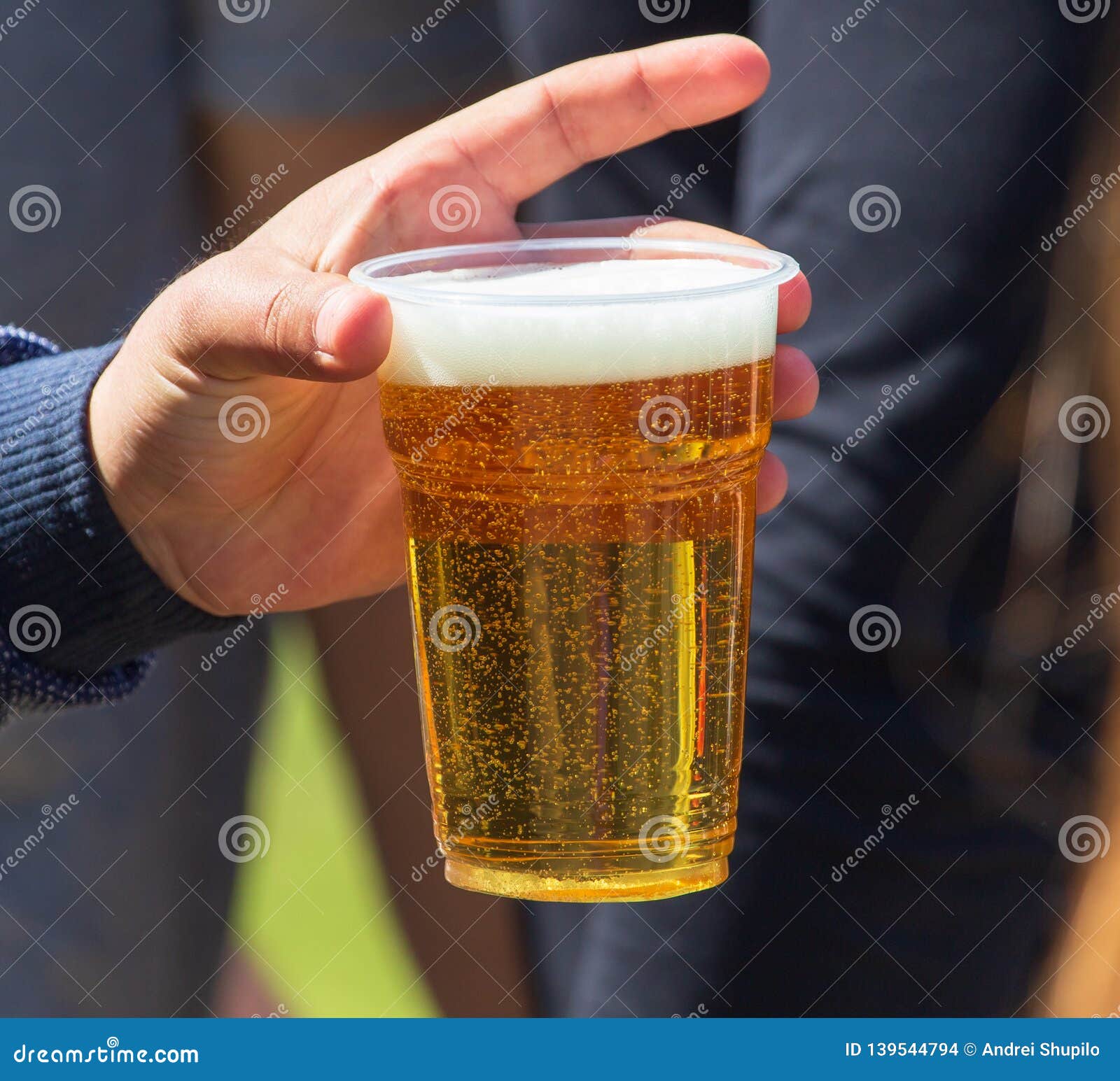 Beer in a plastic cup Stock Photo by Ha4ipuri