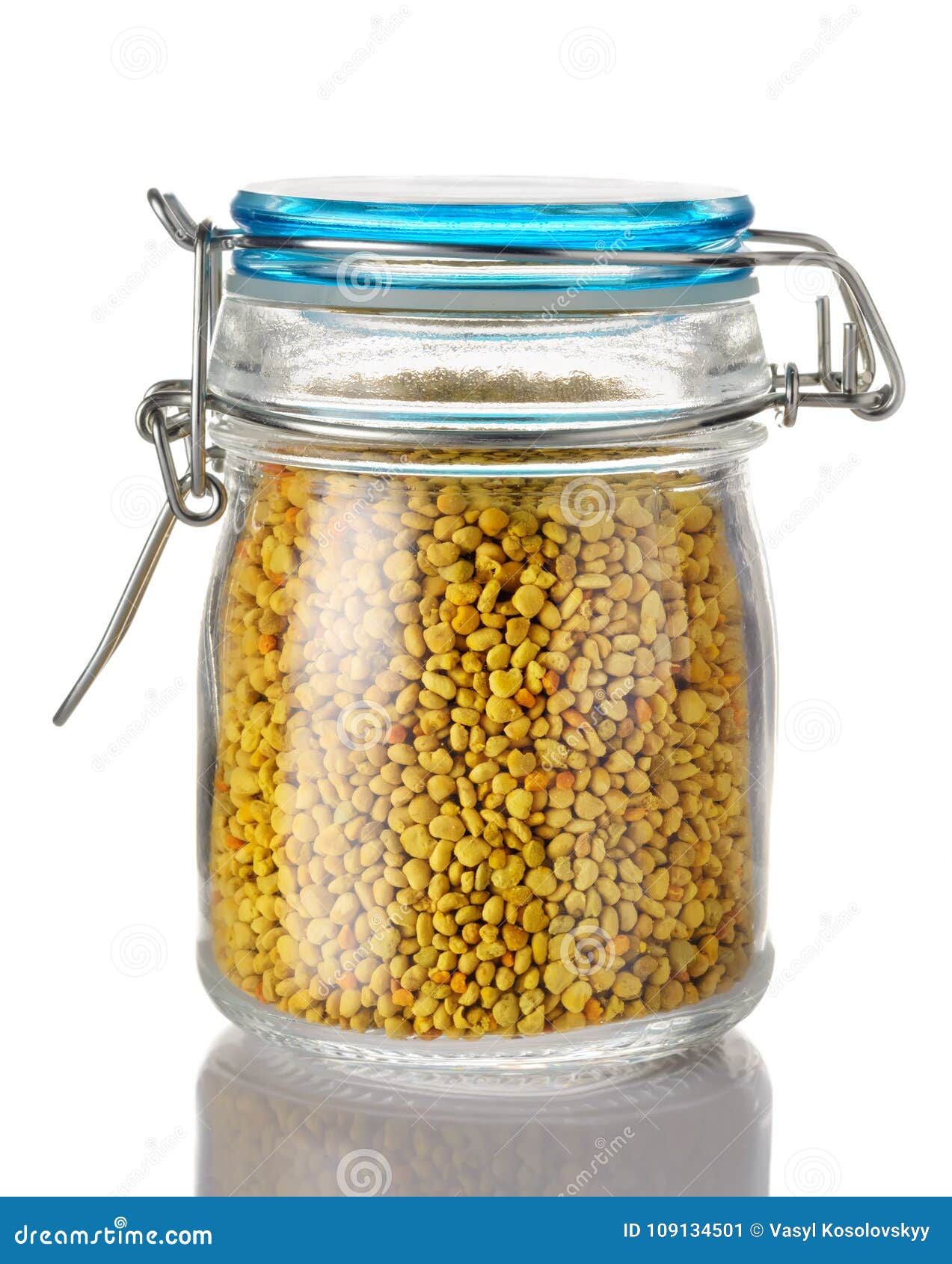 a beer pollen in a glass jar is on a white background. natural remedy for immunity enhancement. beekeeping