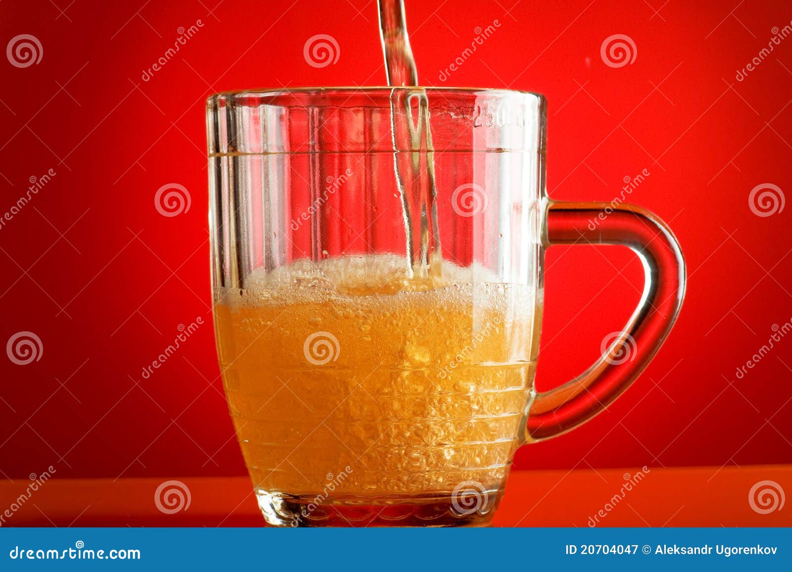 Beer on red stock image. Image of white, gold, color - 20704047