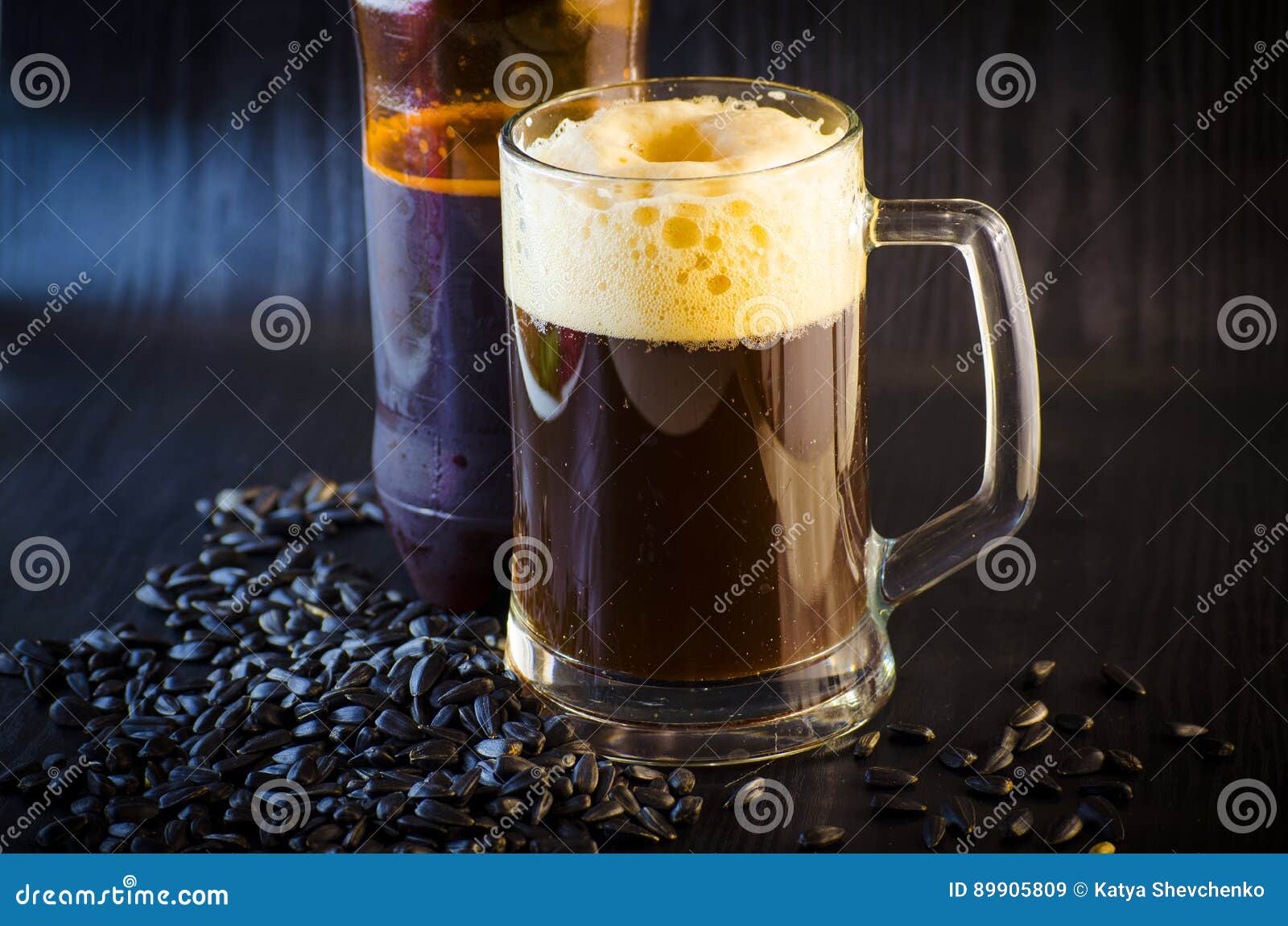 Beer and sunflower seeds stock image. Image of black 89905809
