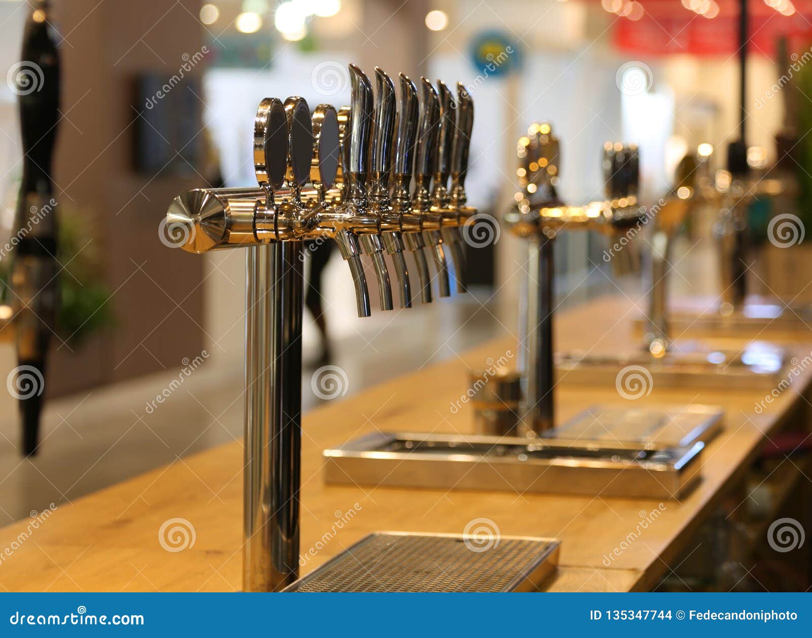 Beer Taps on the Counter of an Irish Pub Stock Photo Image of